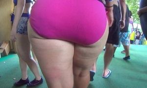 Cougar with huge bootie whide thighs waterpark