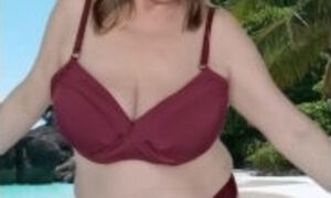 Hot GILF with huge natural tits in bikini