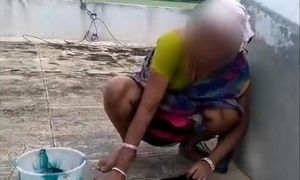 Desi Aunty Washing Clothes and displaying twat in Saree