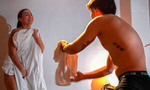Big-assed stepmother comes out of the bathroom naked after her stepson plays a prank on her