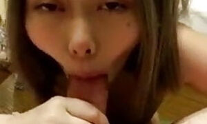 Asian cutie giving head