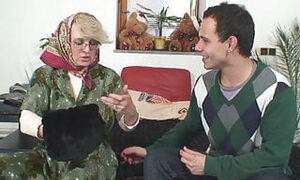 60 years senior gal opens up gams for him