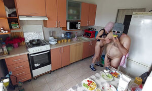 Amateur couple having fun in the kitchen. Amateur milf with hairy pussy, big ass, big tits.