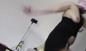 Sexy wife has fun testing clothes and cutting them. Brunette dances naked around the house.