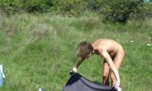 A young woman is fucked while sunbathing in a meadow - part 1