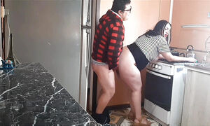 Her stepfather fucks his horny stepdaughter in our kitchen. Her mother almost catches him.