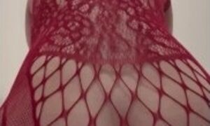 Shemale in red lace lingerie brings her ass to orgasm