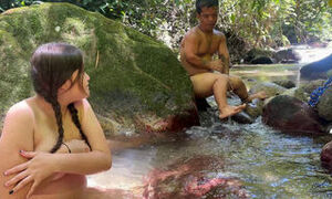 Little dwarf finds a strange woman bathing in the river, gets horny watching her and ends up putting his huge cock in her.