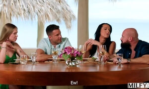 Sexy brunette MILF with nice curves pleases her boyfriend's huge cock with her mouth and pussy on an open balcony