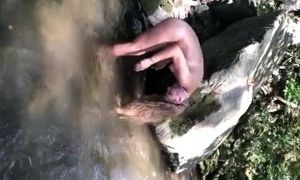 'NAKED BLONDE CAUGHT NAKED IN CREEK'