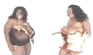 Huge tittied ladies taking modeling pictures