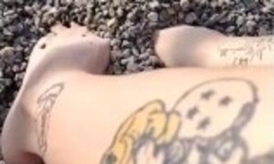 Feet In Pebbles