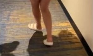 Thick wife walking inside hotel