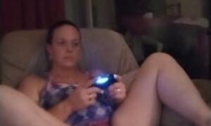 Filming Up Milf's Purple Mini Skirt While She Plays Video Games