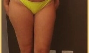 Wifey wears a skimpy yellow bikini