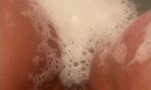 Watch her have soapy shower fun before house chores