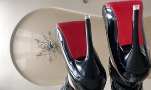 Foot fetish with Christmas mood - on high heels from Mistress Lara in latex