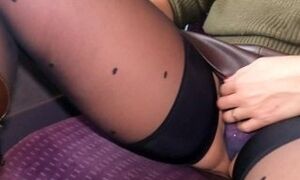 MILF in leather skirt and stockings masturbates her pierced clit in the TGV in first class