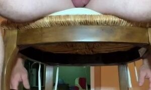'Amateur milf rides a big dick in her ass on a chair'